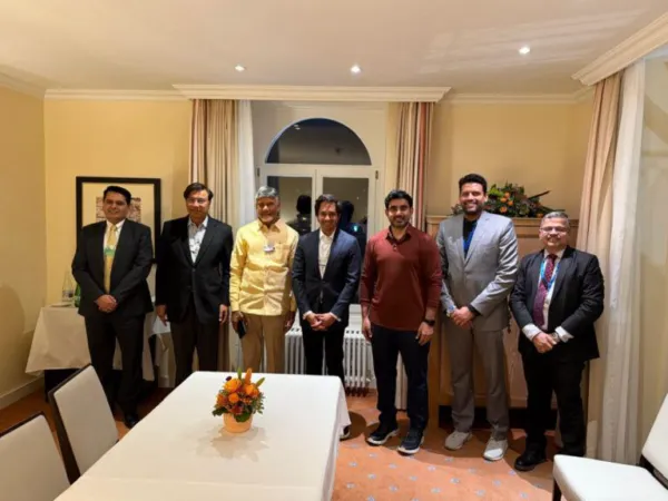 Babu, Lokesh Meet Mittal at Davos