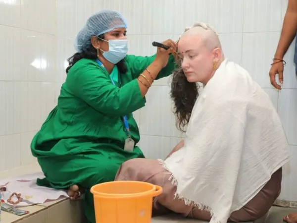 Pawan Kalyan's Wife Offers Tonsure at Tirumala