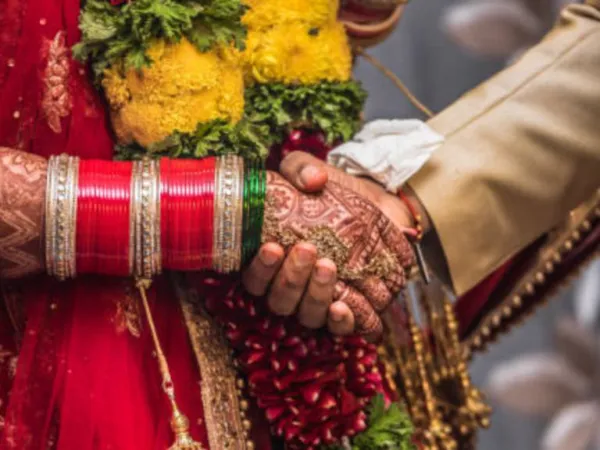 Marriage Scam Shocker: 1 Woman, 25 Weddings