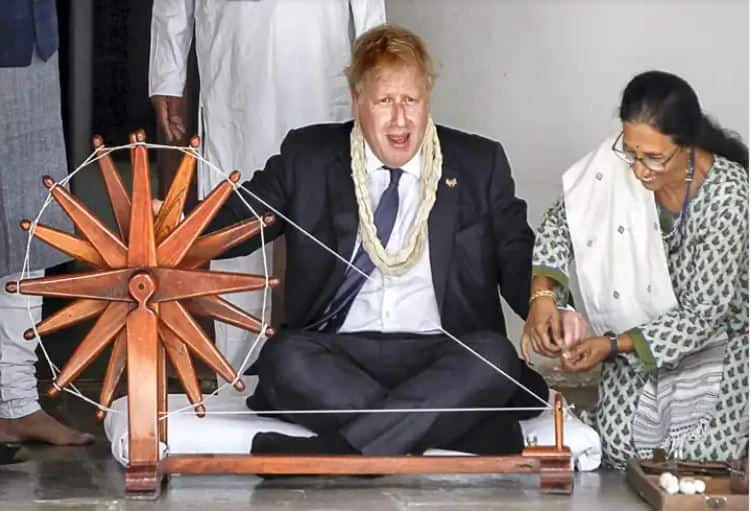 WATCH: UK PM Boris Johnson Tries His Hands On 'Charkha' At Sabarmati Ashram