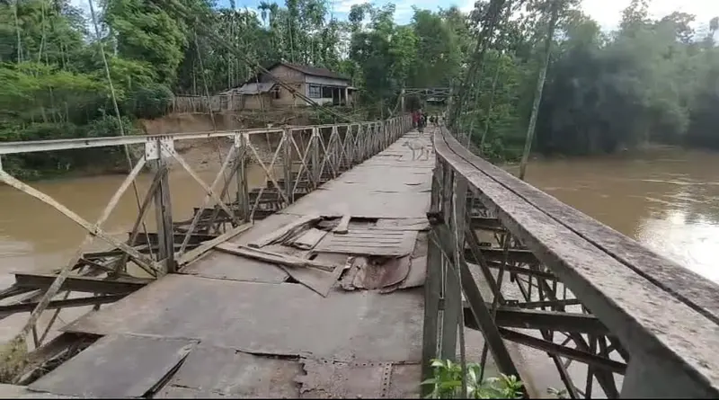Century-Old Hanging Iron Bridge Over Diffloo River Near Bokakhat on Verge of Collapse