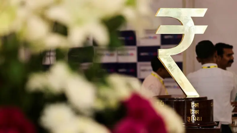 Rupee hits  ₹95: 6 ways the fall affects your personal finances, experts weigh in