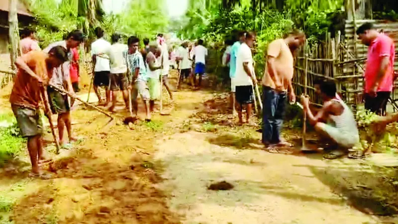 Residents in Rani repair village roads through voluntary labour ahead of monsoon