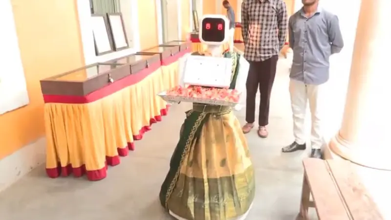 Robot in saree greets voters at Puducherry Assembly poll booth