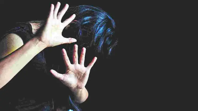 మహిళపై దంపతుల దాడి