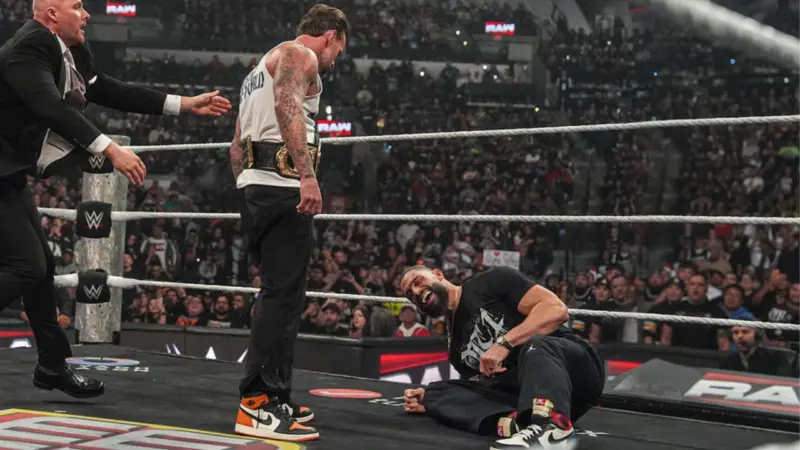 WWE Raw 3/16: CM Punk Throws a Punch at Roman Reigns After Being Called Old