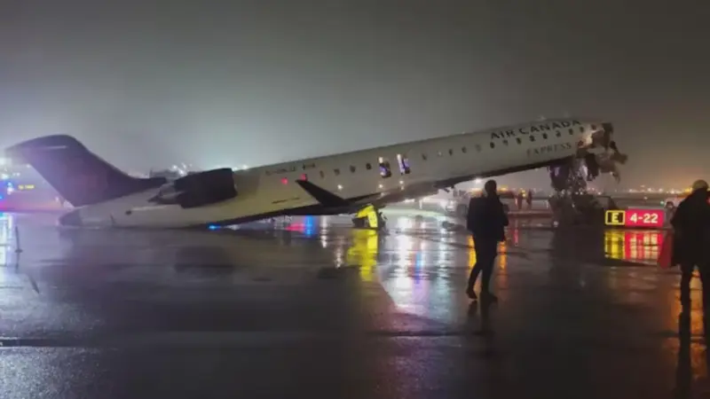 Plane collides with fire truck at New York's LaGuardia Airport; Several injured
