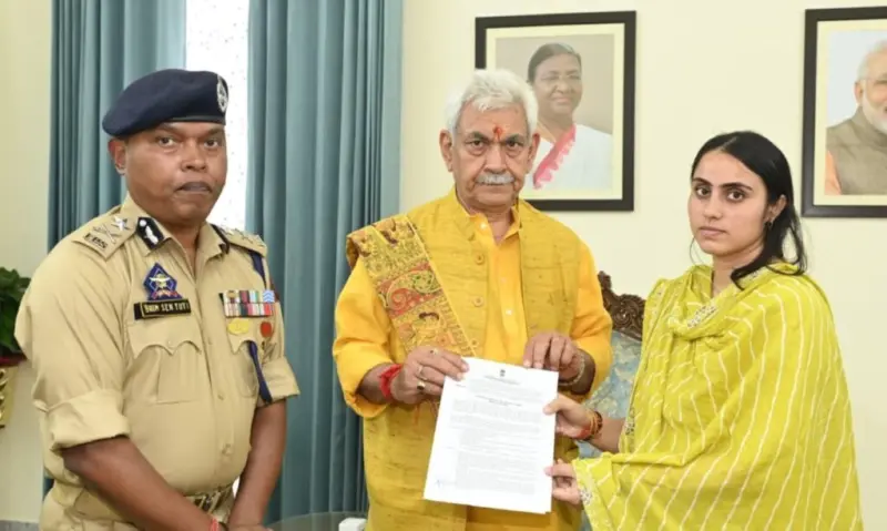 LG Manoj Sinha hands over job letter to martyred police officer's wife in Jammu