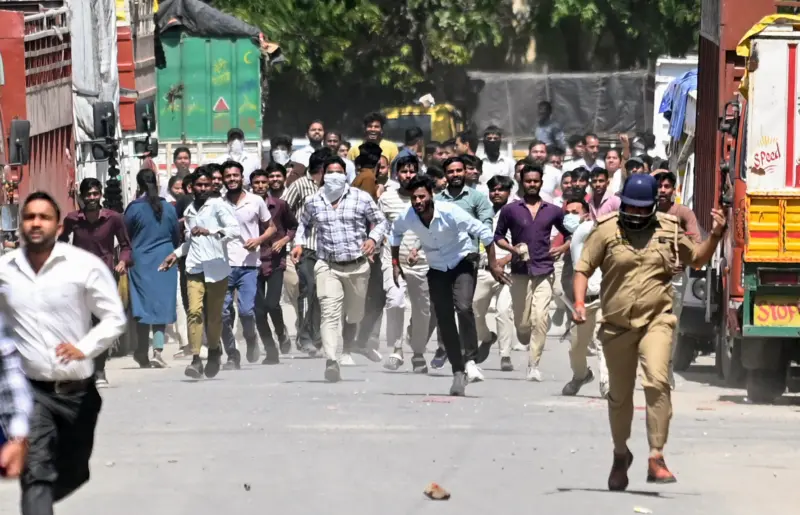 Workers' protest over wage hike turns violent in Noida, vehicles torched; 50 held for rioting