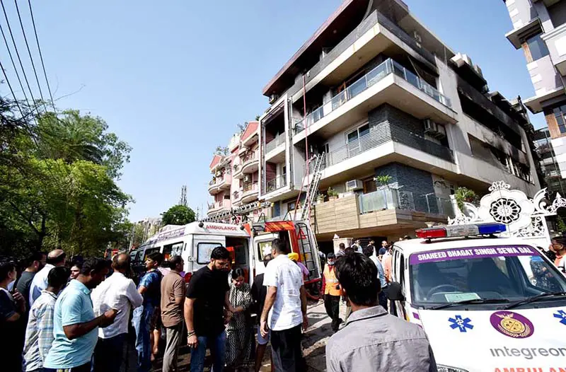 9 of 2 families dead in fire