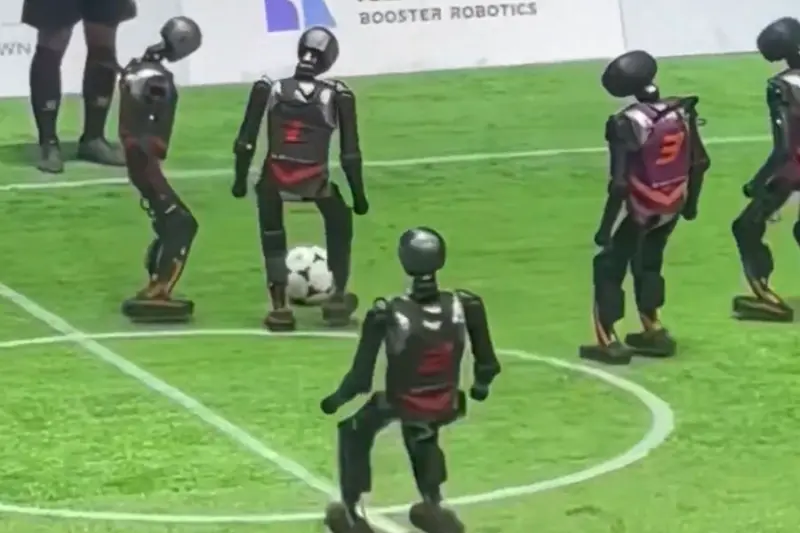 AI-powered robots play football as world marvels at China's tech leaps