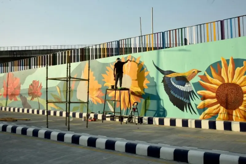 From Tollygunge to New Town, how one artist is colouring Kolkata's streets with murals