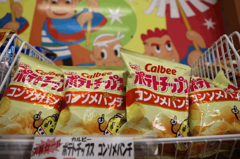 Japan's Calbee switches snack packets to black and white amid Iran war supply crunch