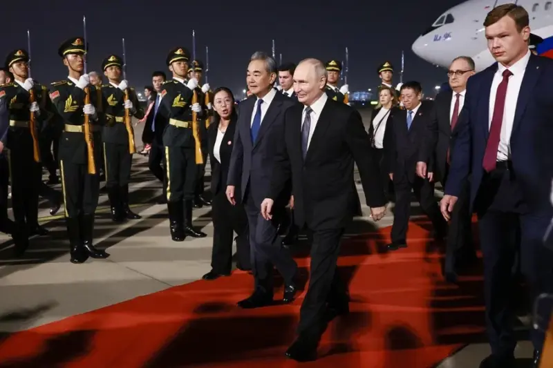 Days after Trump visit, Putin lands in Beijing for key summit