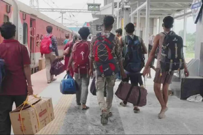 Migrants keep fingers crossed for May 4; some stay back for results, others leave for work