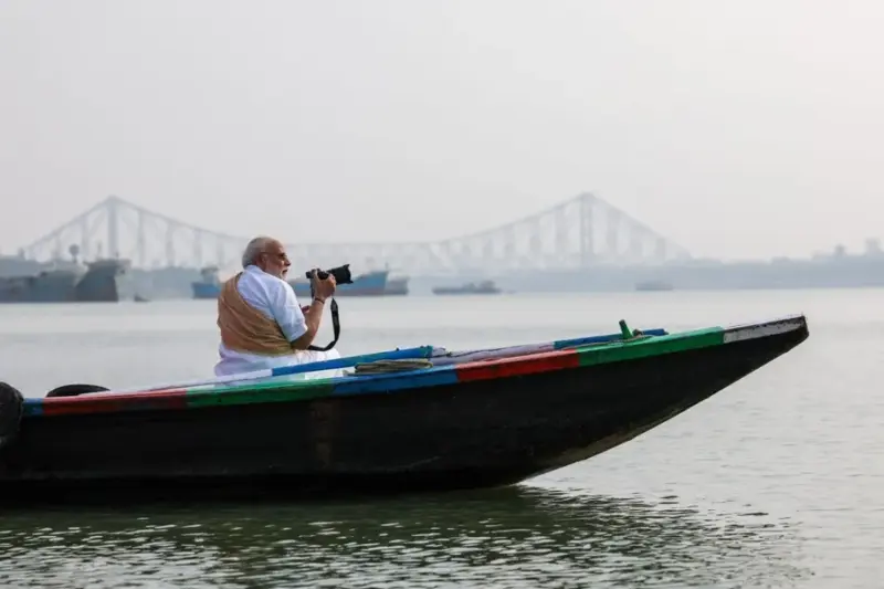 PM Modi sails across Hooghly River in West Bengal following mega roadshow in Howrah| VIDEO