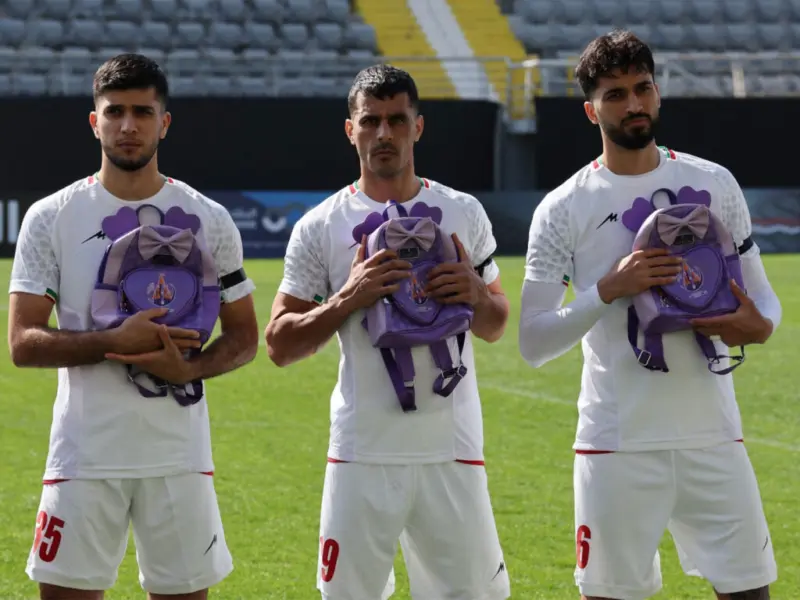 Iran football team pays tribute to children killed in Minab school bombing