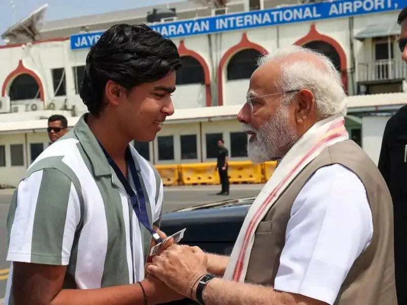PM Modi meets 'cricketing sensation' Vaibhav Suryavanshi at Patna airport