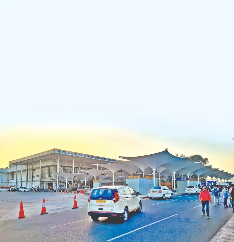 Welcome to Ahmedabad airport Where cab is king, auto's pedestrianThose booking autos must walk a kilometre to the stand or suffer an uncomfortable shuttle ride while cab users get VIP access